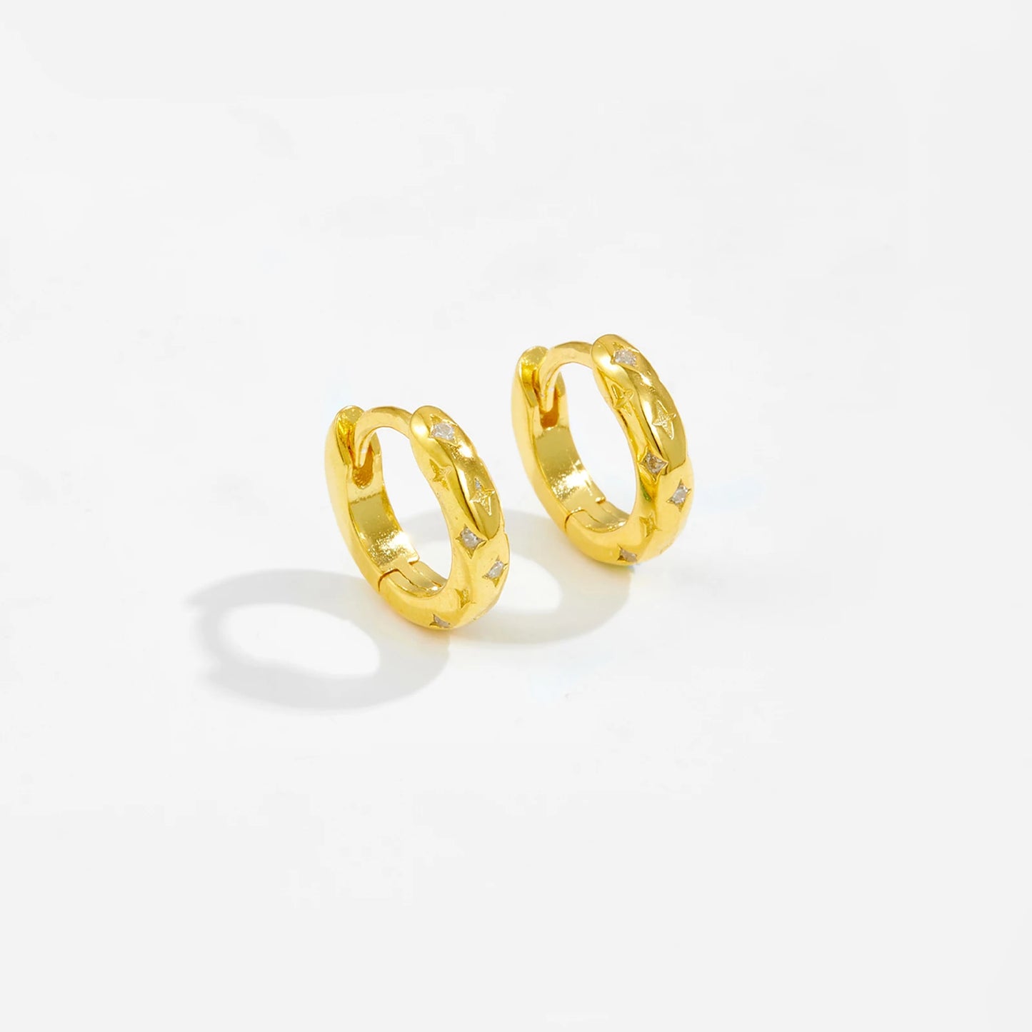 Stellar Gold Star Huggie Hoops